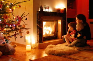 mother-and-daughter-at-holiday-fire