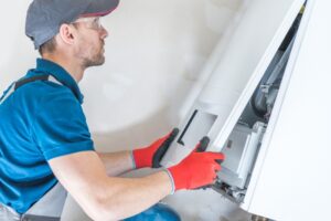 furnace-with-technician-checking-it