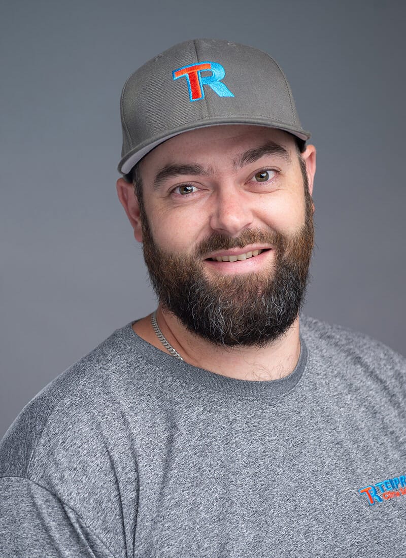 Portrait of Jason, a professional team member at Temprite, smiling for a staff photo