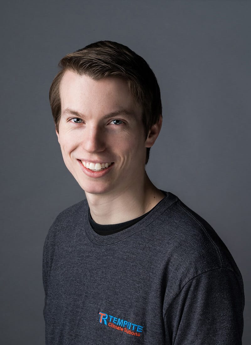 Portrait of Jonathan, a professional team member at Temprite, smiling for a staff photo
