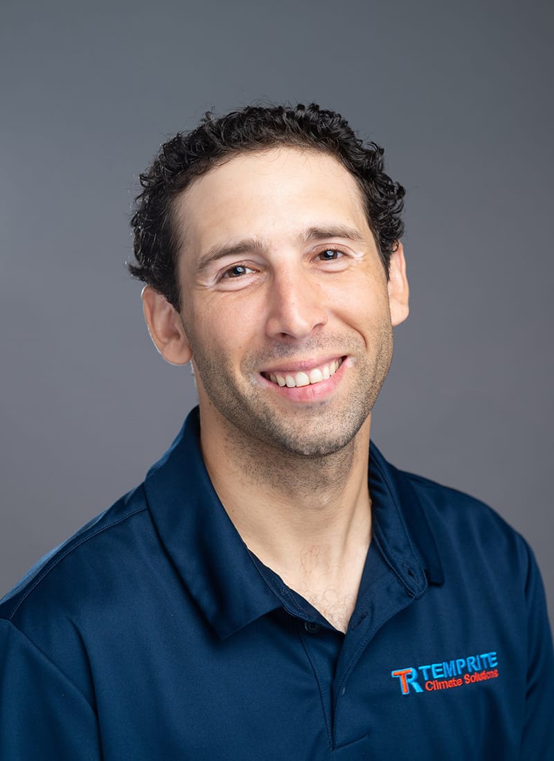 Portrait of Keanan, a professional team member at Temprite, smiling for a staff photo