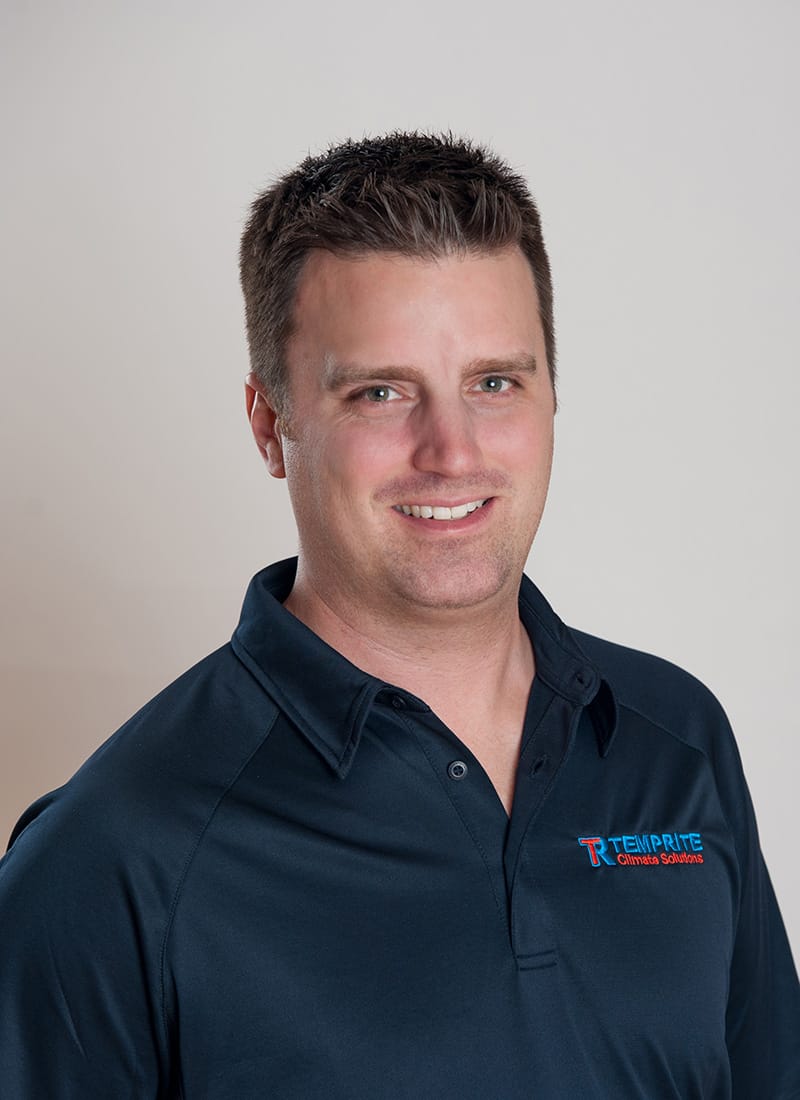 Portrait of Lance, a professional team member at Temprite, smiling for a staff photo