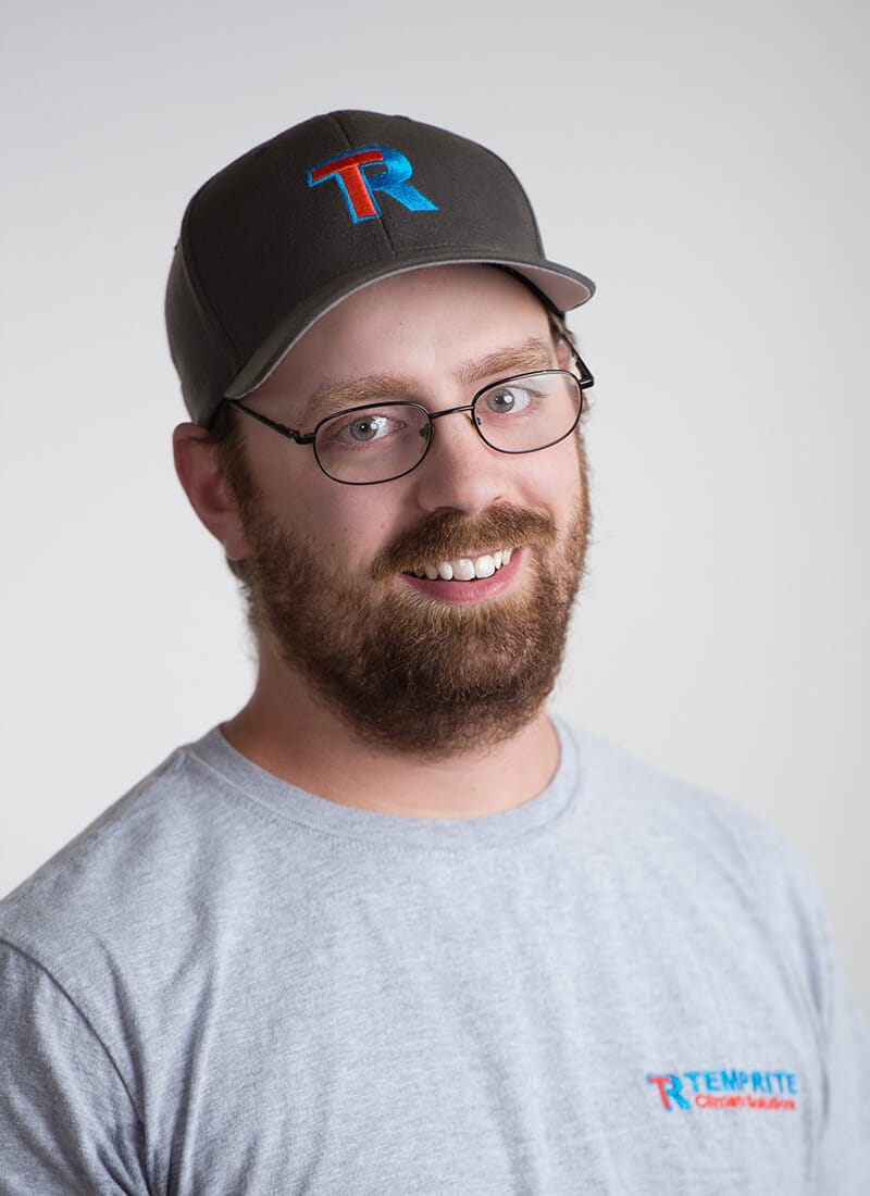 Portrait of Shawn, a professional team member at Temprite, smiling for a staff photo