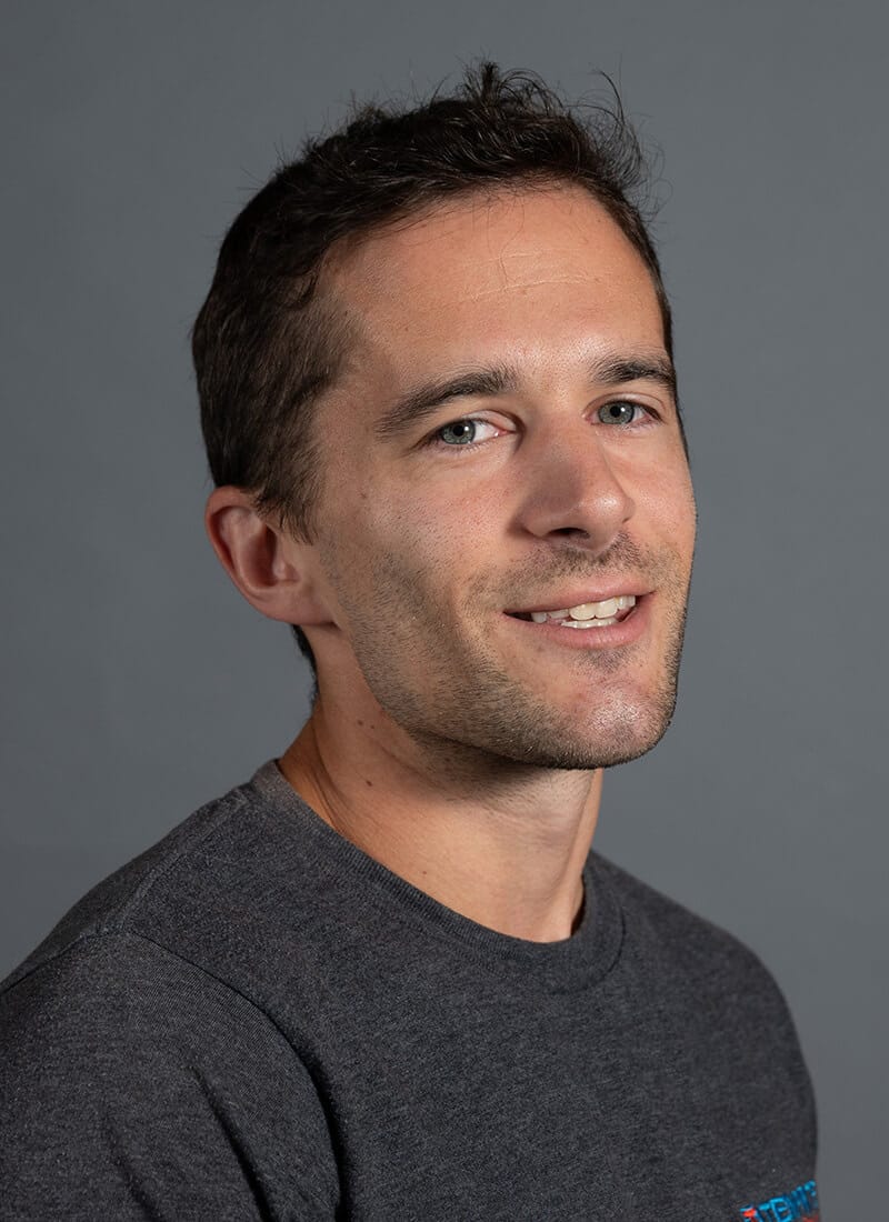 Portrait of Will, a professional team member at Temprite, smiling for a staff photo